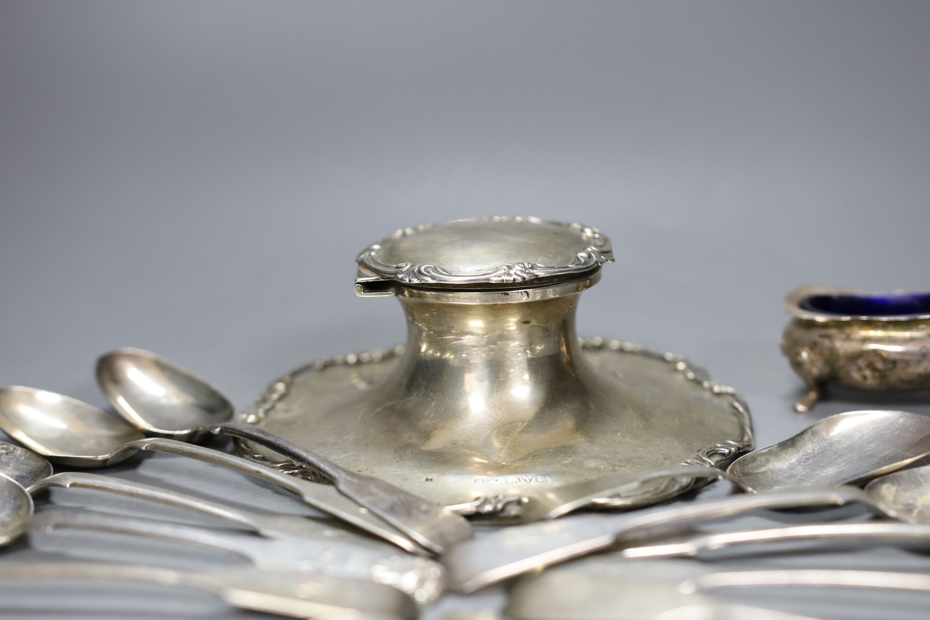 An early 20th century silver mounted inkwell, a silver salt and a small group of silver cutlery including a set of six teaspoons, Thomas Sewell I, Newcastle, 1875